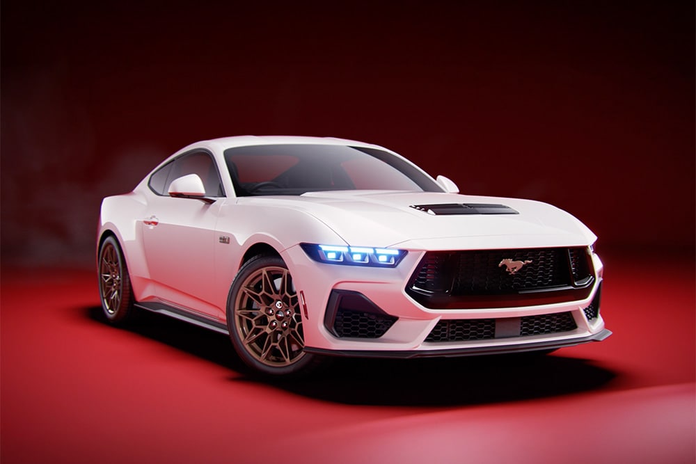 1000x1000 image of a navy blue Ford Mustang parked on a driveway as a person walks by checking it out.